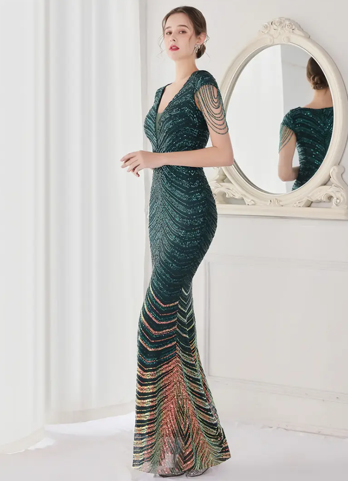 An elegant sequined mermaid evening gown - geometric patterned polyester floor length skirt with deep V-neck and short sleeves for all seasons